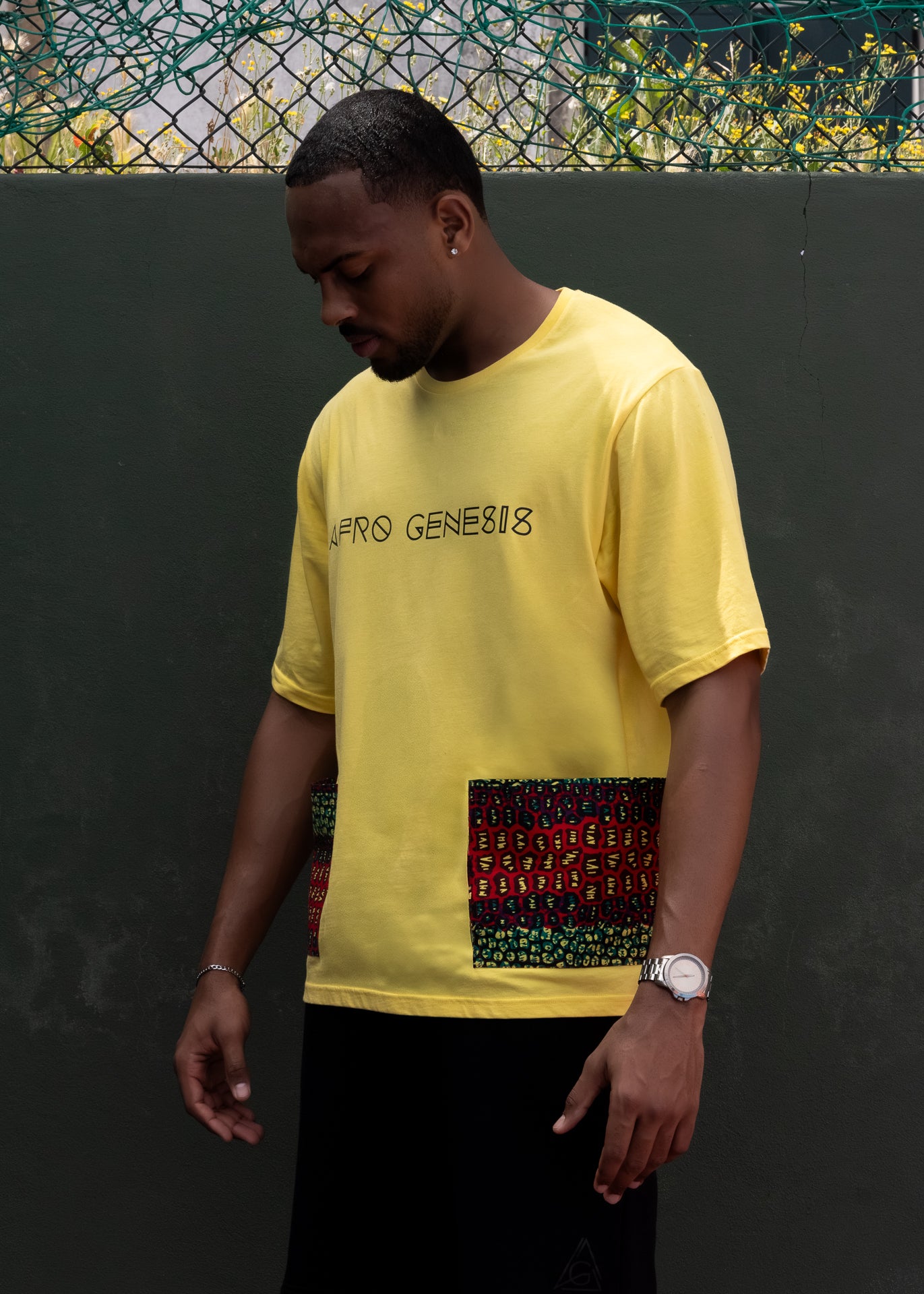 T-shirt oversize com bolsos em capulana